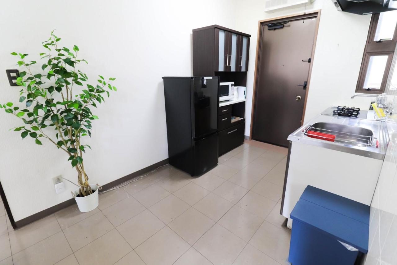 Condominium Hotel Mihama Upi Chatan Cameră foto